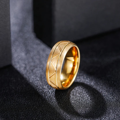 Gold ring with intricate design tungsten carbide